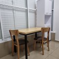 Wooden dining table with metal legs