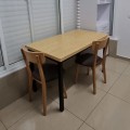Wooden dining table with metal legs