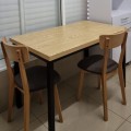 Wooden dining table with metal legs