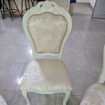 Wooden chair in a classic style, milky color