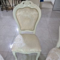 Wooden chair in a classic style, milky color