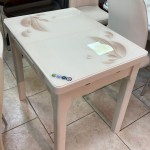 Small glass dining table cream-colored