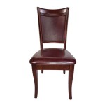 A wooden chair with a seat upholstered in imitation leather